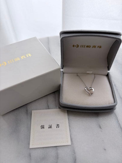 TASAKI Pearl Heart Pendant made of Silver925 with 3.5mm pearl on a white background