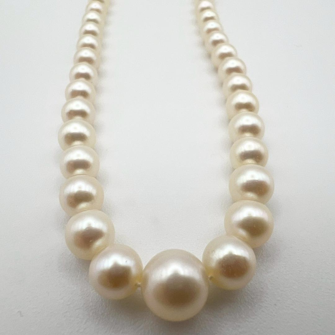 MIKIMOTO pearl necklace with white 7mm pearls and silver fittings, classic design, used condition
