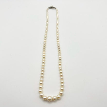 MIKIMOTO pearl necklace with white 7mm pearls and silver fittings, classic design, used condition