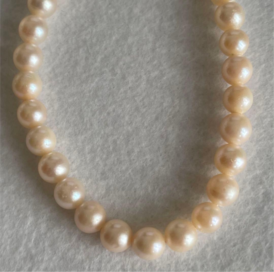 Vitamin Tiger's Eye 7mm bead necklace 40cm and matching silver earrings with slight yellow tone