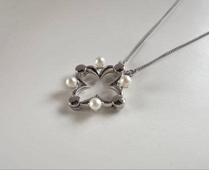 TASAKI Akoya baby pearl necklace with silver clover motif pendant and adjustable chain