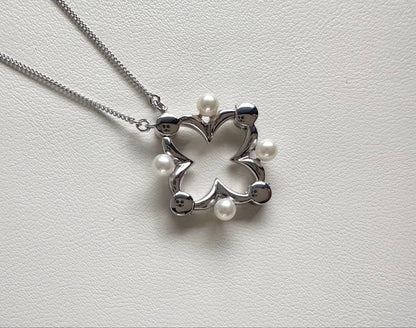 TASAKI Akoya baby pearl necklace with silver clover motif pendant and adjustable chain