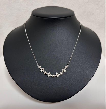 TASAKI Akoya baby pearl necklace with silver clover motif pendant and adjustable chain