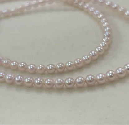 Akoya pearl necklace with 3.5-4mm pearls, 43cm length, stamped 925, displayed on white background