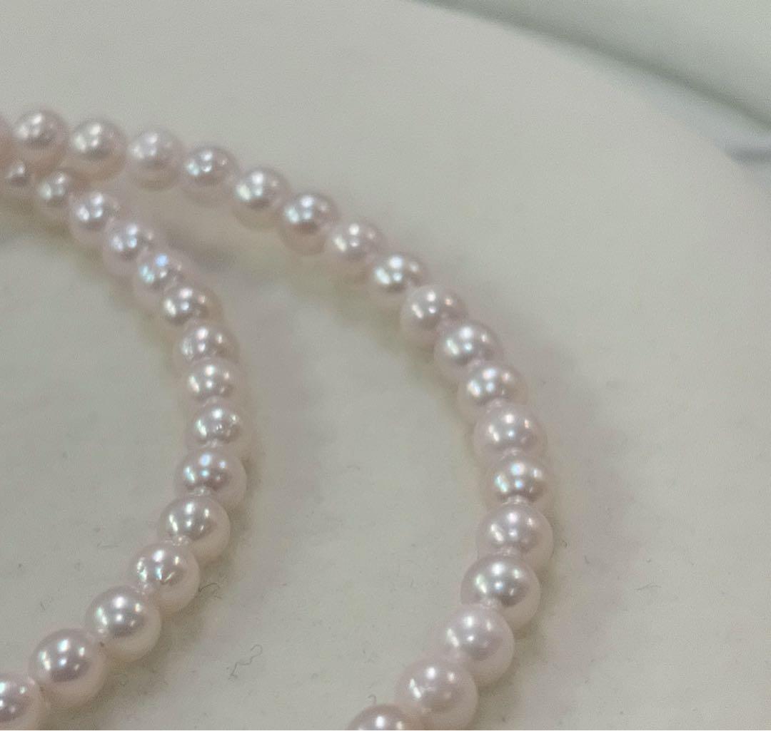 Akoya pearl necklace with 3.5-4mm pearls, 43cm length, stamped 925, displayed on white background