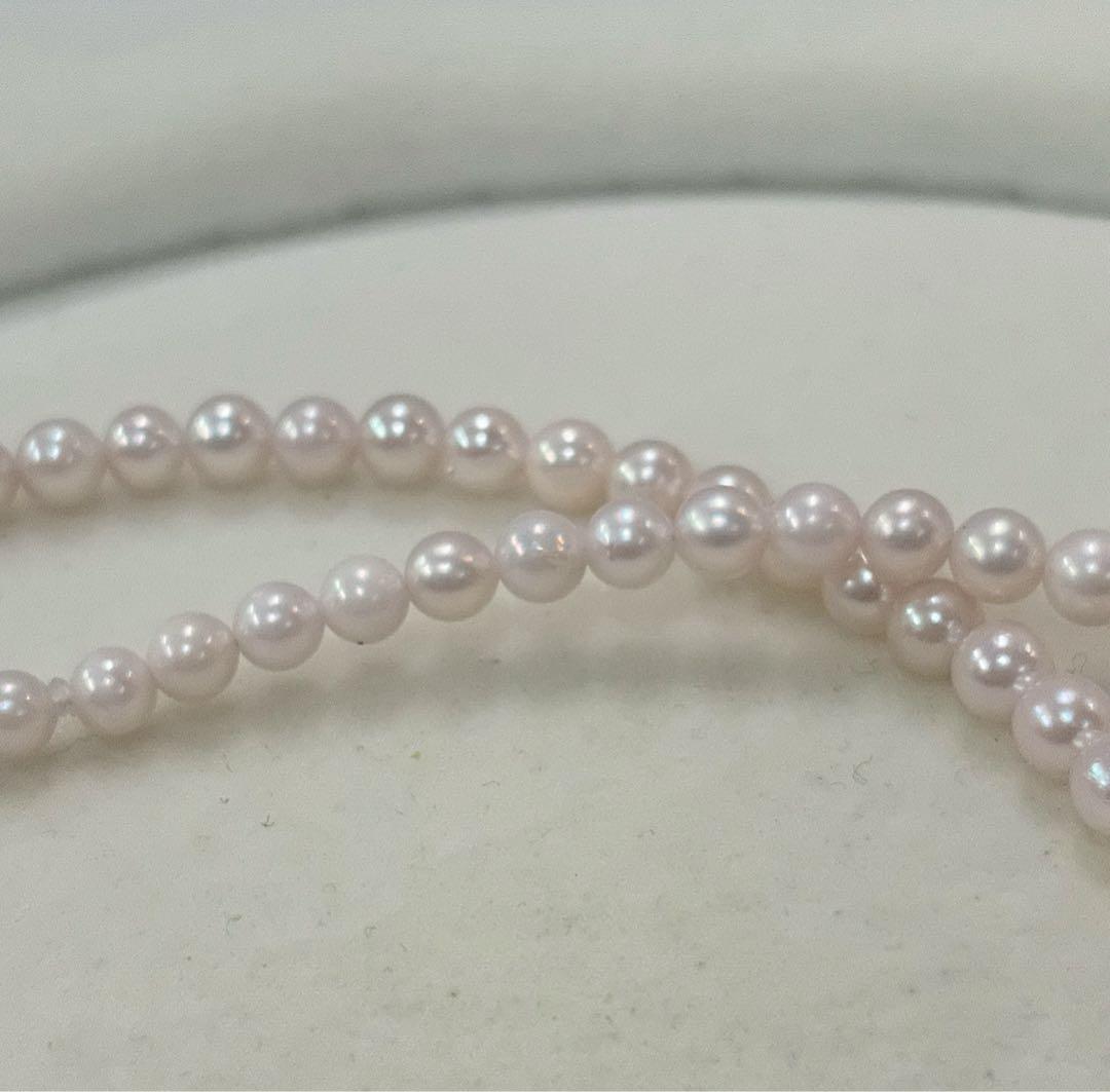 Akoya pearl necklace with 3.5-4mm pearls, 43cm length, stamped 925, displayed on white background
