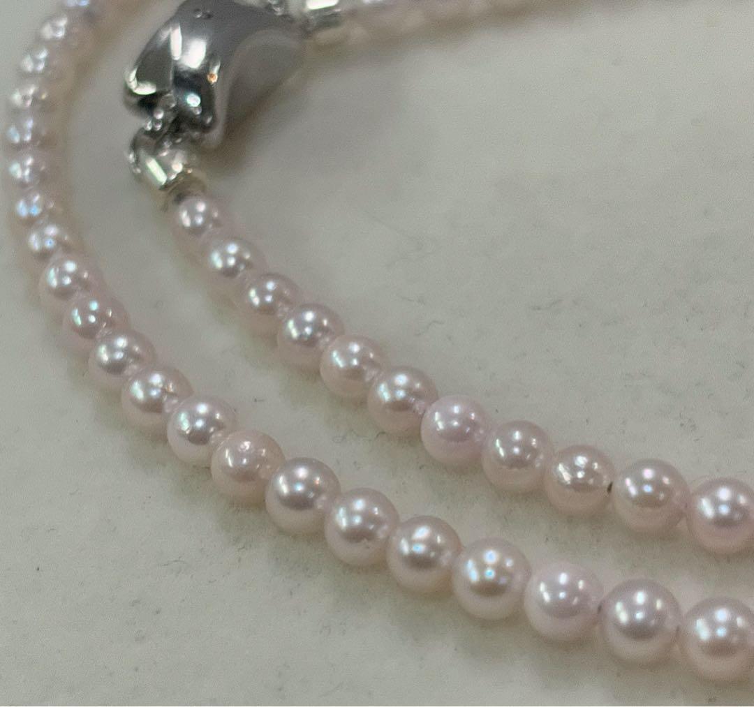 Akoya pearl necklace with 3.5-4mm pearls, 43cm length, stamped 925, displayed on white background