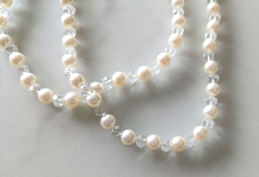 Tasaki Pearl Variation Long Necklace in white featuring 100 pearls and 95 Swarovski beads on a 120 cm chain