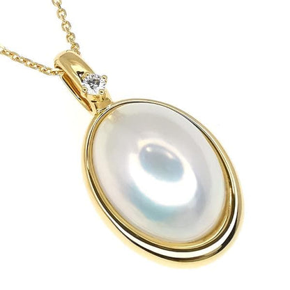 TASAKI K18 yellow gold necklace with a Mabe pearl pendant and small diamond accents on a 45cm chain