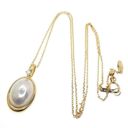 TASAKI K18 yellow gold necklace with a Mabe pearl pendant and small diamond accents on a 45cm chain