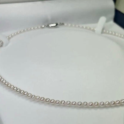 Akoya pearl baby pearl necklace with 3.0-3.5mm white pearls on silver and gold SV925 chain 42cm long