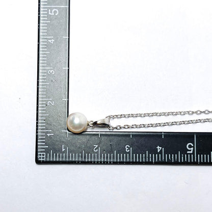 Mikimoto pearl necklace featuring a 6.5mm pearl with silver pendant on a 40.5cm chain