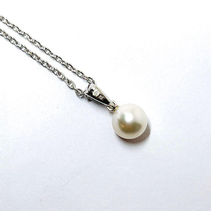 Mikimoto pearl necklace featuring a 6.5mm pearl with silver pendant on a 40.5cm chain