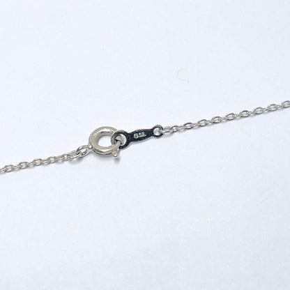 Mikimoto pearl necklace featuring a 6.5mm pearl with silver pendant on a 40.5cm chain