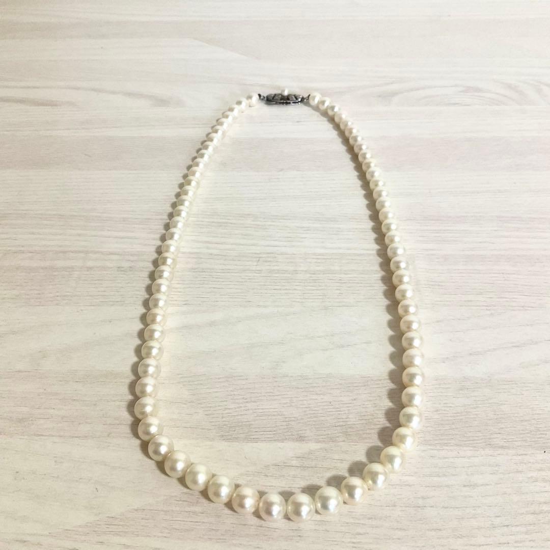 Mikimoto elegant 6mm Akoya pearl necklace with 45cm silver chain displayed on white background