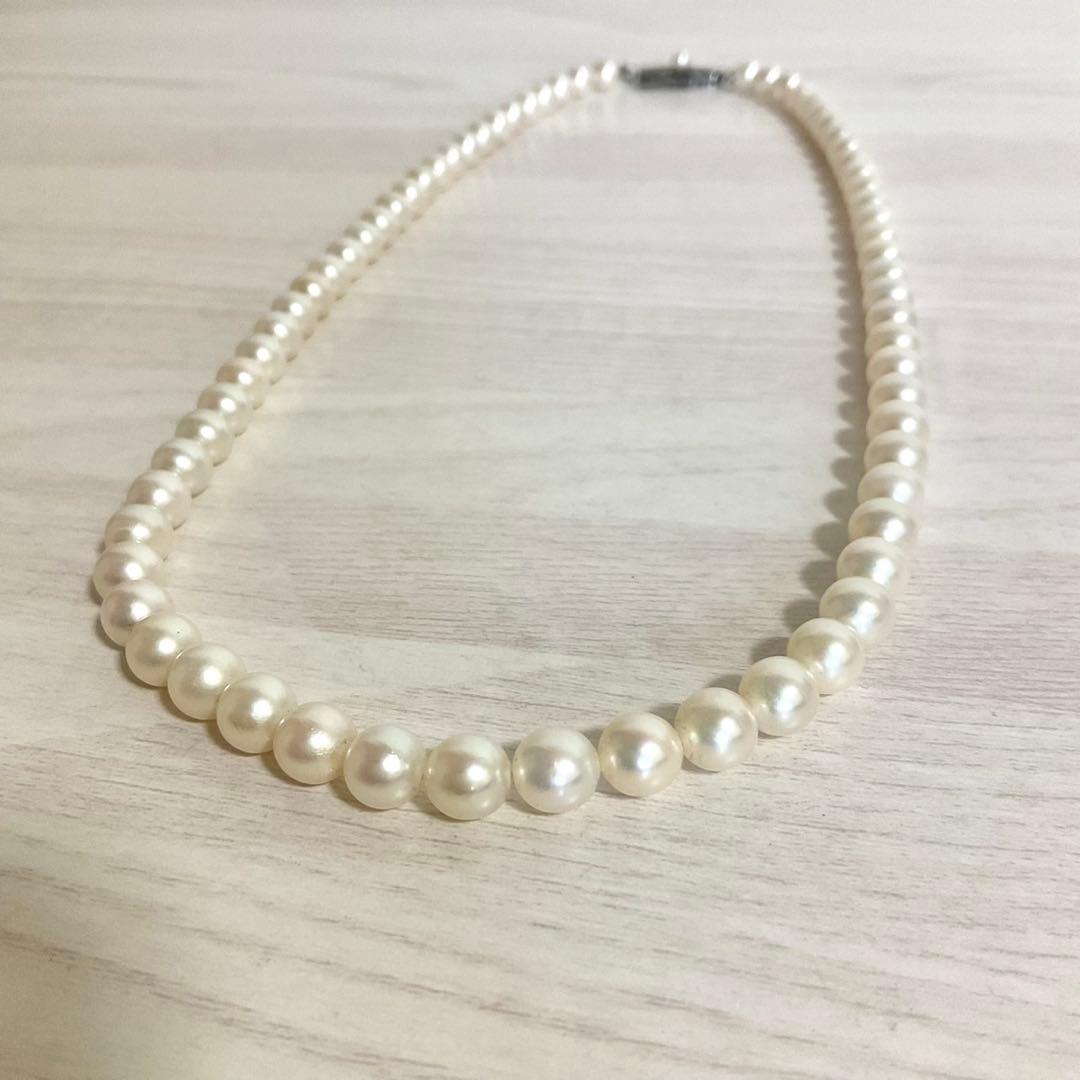 Mikimoto elegant 6mm Akoya pearl necklace with 45cm silver chain displayed on white background