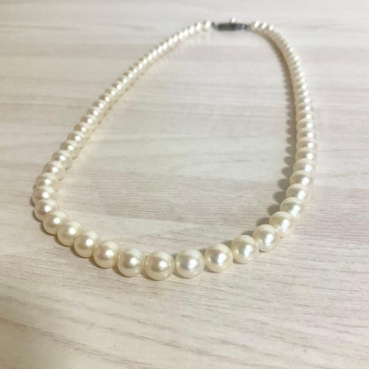 Mikimoto elegant 6mm Akoya pearl necklace with 45cm silver chain displayed on white background