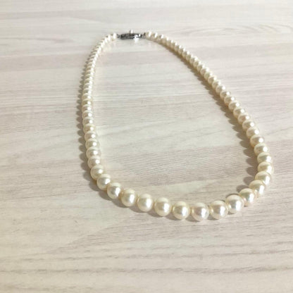 Mikimoto elegant 6mm Akoya pearl necklace with 45cm silver chain displayed on white background