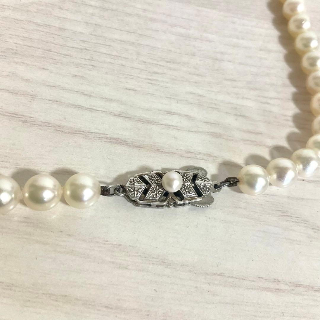 Mikimoto elegant 6mm Akoya pearl necklace with 45cm silver chain displayed on white background