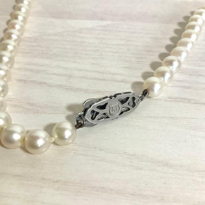 Mikimoto elegant 6mm Akoya pearl necklace with 45cm silver chain displayed on white background