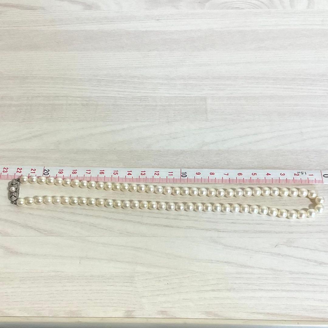 Mikimoto elegant 6mm Akoya pearl necklace with 45cm silver chain displayed on white background