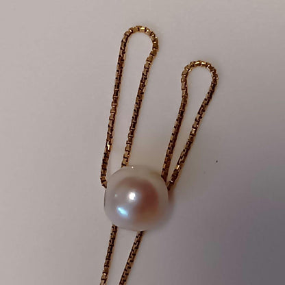 K18 Akoya Pearl Necklace with simple pearl design and hook clasp on a white background
