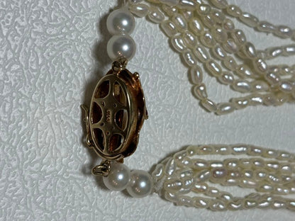 14k Akoya Keshi pearl necklace with ruby clasp 60cm displayed on white background
