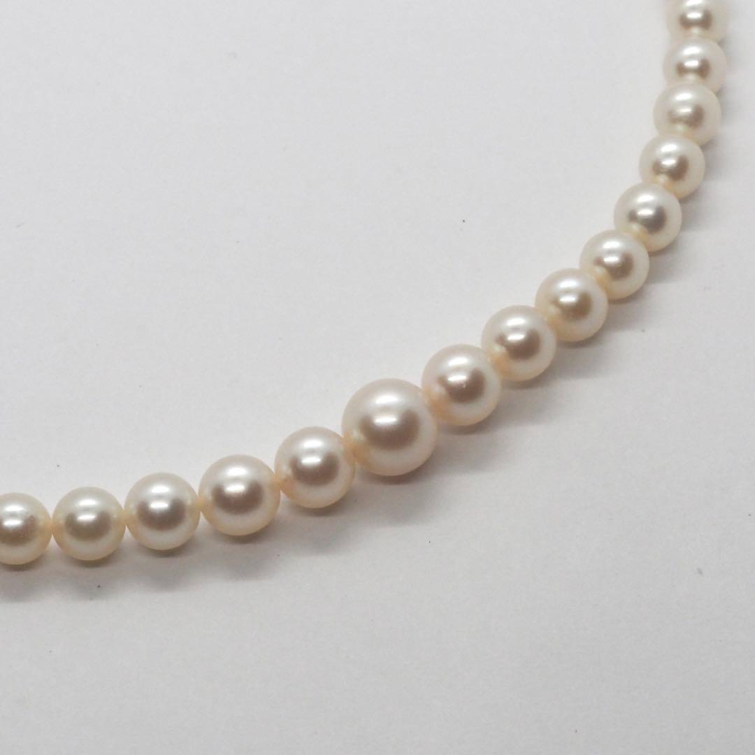 Mikimoto pearl necklace with 98 pearls on silver chain measuring 44.5 cm