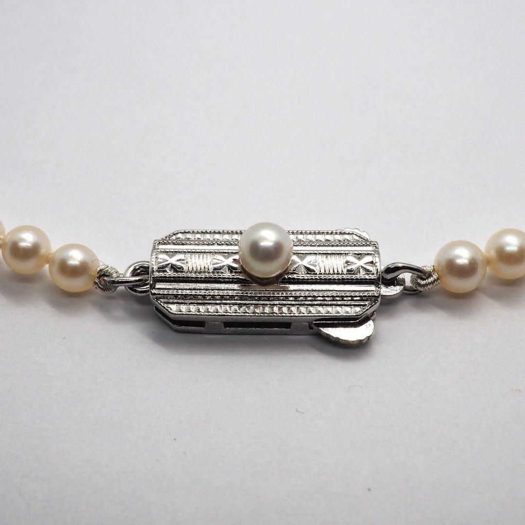 Mikimoto pearl necklace with 98 pearls on silver chain measuring 44.5 cm
