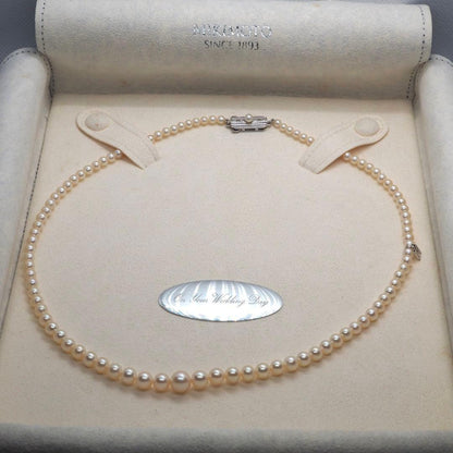 Mikimoto pearl necklace with 98 pearls on silver chain measuring 44.5 cm