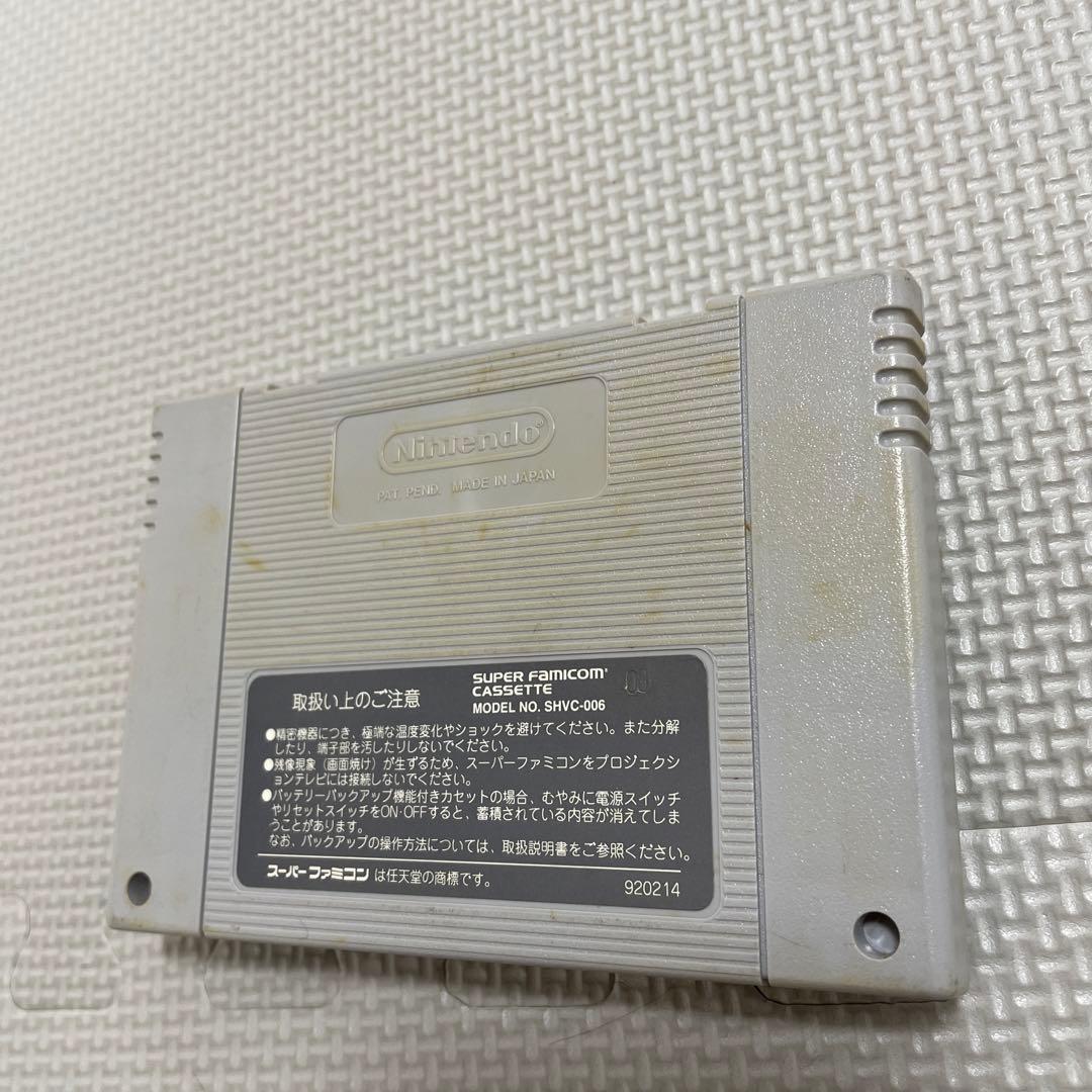 Super Famicom Live A Live game cartridge with box, manual, and plastic case showing visible discoloration on the back