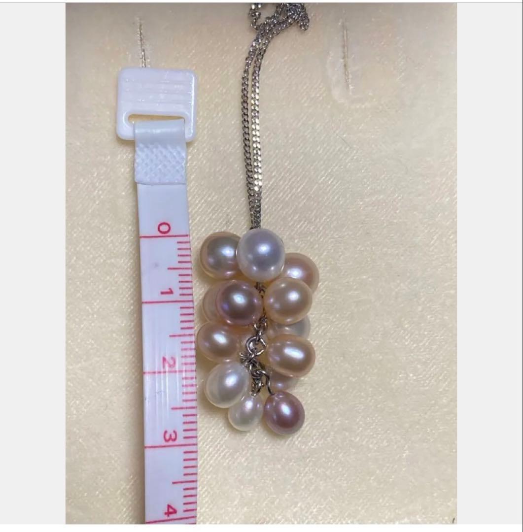 Mikimoto Pearl Island beaded necklace with 14 pearls of various sizes and colors on a 40 cm chain
