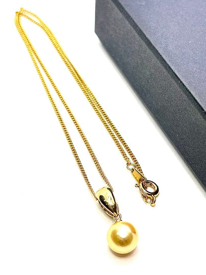 Akwoya 9mm large genuine gold colored pearl necklace measuring 40cm with natural color pearls