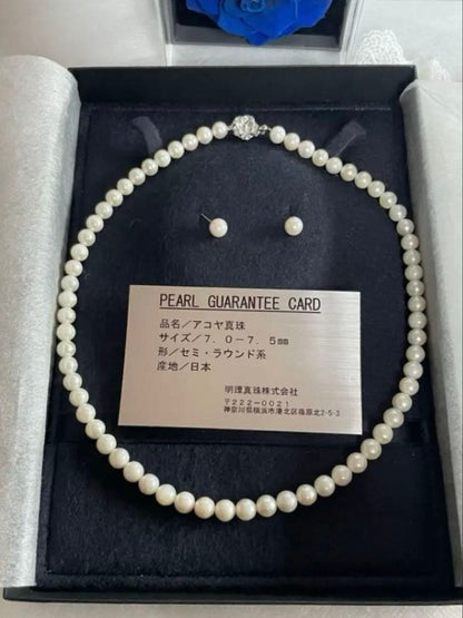 Akoya pearl necklace and earrings set with 7.5mm pearls in 14K white gold, necklace length 47 cm