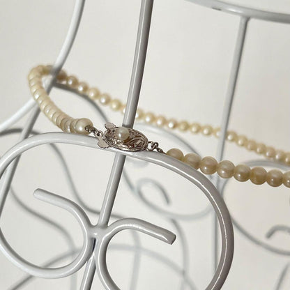 Baby Pearl silver Akoya pearl necklace with 5-6mm pearls and approximately 40cm neck circumference