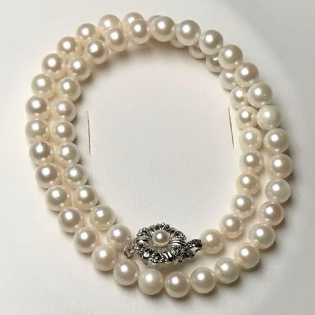 Akoya pearl white pearl necklace with round 6.3-6.7mm pearls and silver marking on a 40cm strand