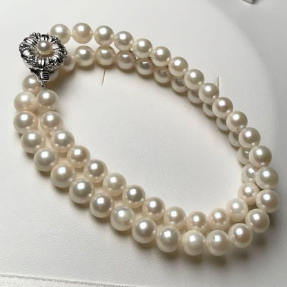 Akoya pearl white pearl necklace with round 6.3-6.7mm pearls and silver marking on a 40cm strand