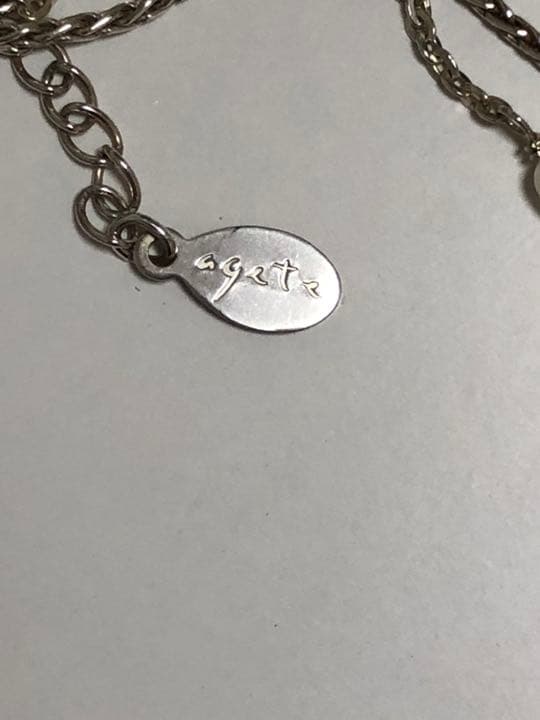 Akat necklace featuring two strands of varied size freshwater pearls on a 40 cm silver chain