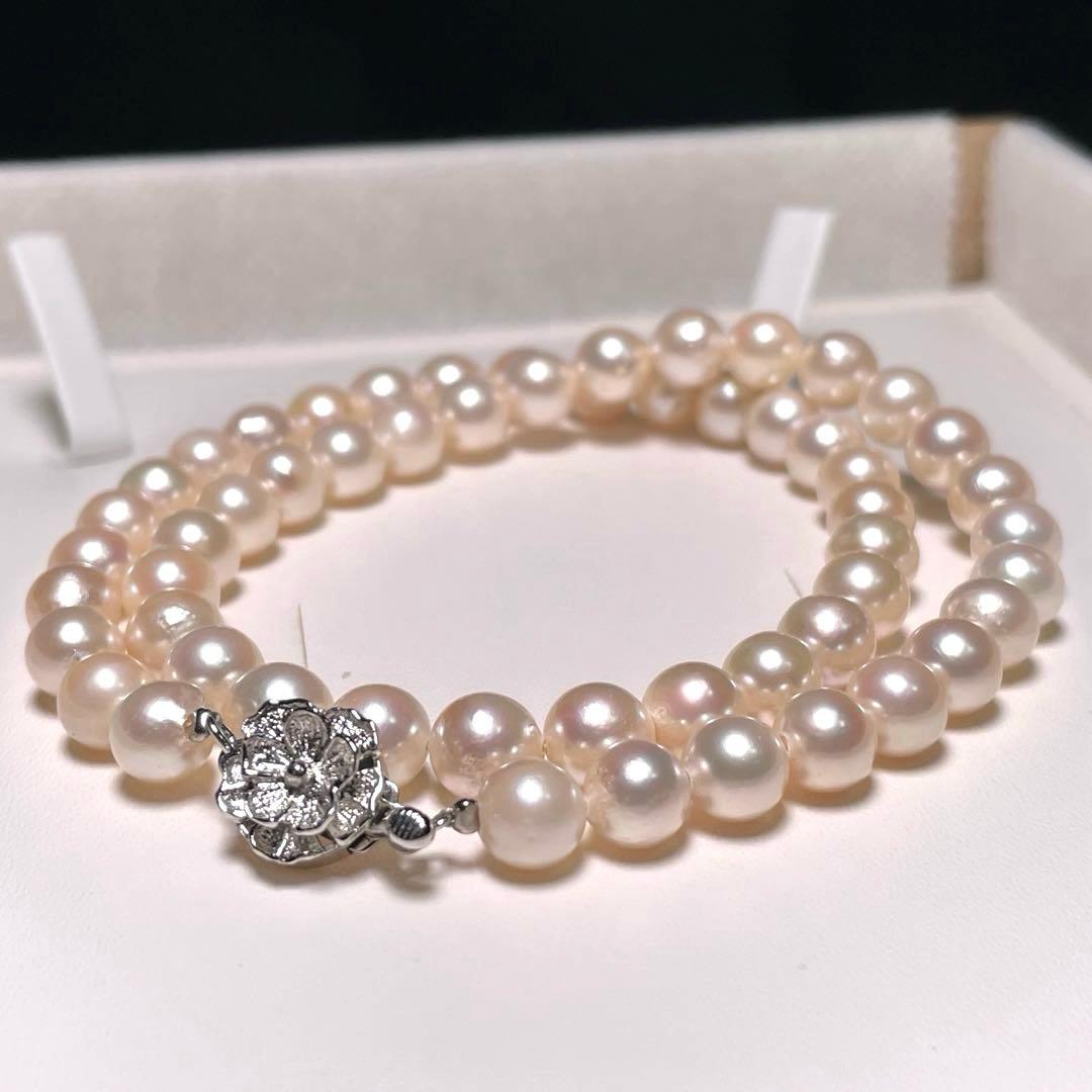 Akoya pearl necklace with round white pearls 6.9 to 7.5mm diameter on a 42.1cm silver chain