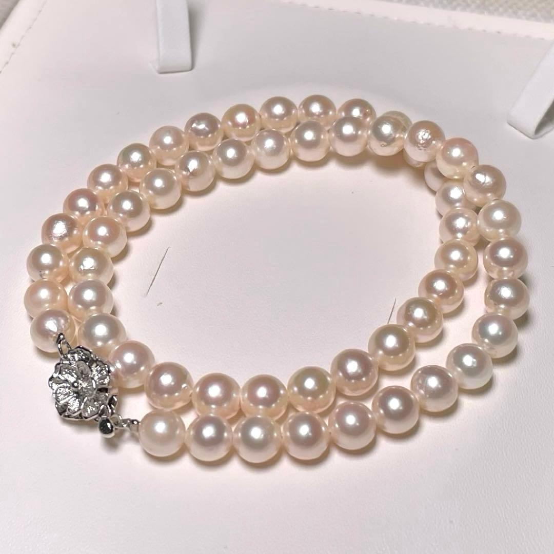 Akoya pearl necklace with round white pearls 6.9 to 7.5mm diameter on a 42.1cm silver chain