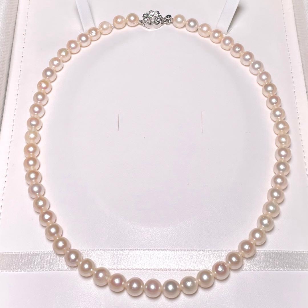 Akoya pearl necklace with round white pearls 6.9 to 7.5mm diameter on a 42.1cm silver chain