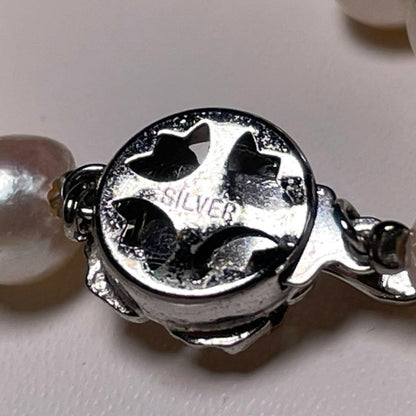 Akoya pearl necklace with round white pearls 6.9 to 7.5mm diameter on a 42.1cm silver chain