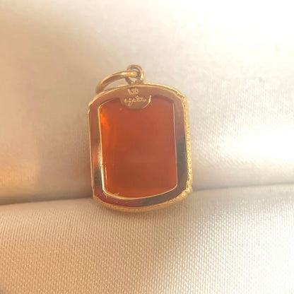 Agete Carnelian Charm made of 10 karat gold with an orange carnelian stone, no visible damage or discoloration