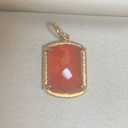 Agete Carnelian Charm made of 10 karat gold with an orange carnelian stone, no visible damage or discoloration