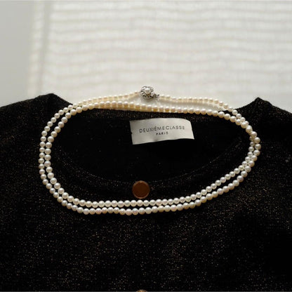 New Akoya pearls genuine baby long necklace 80.5cm with 5.0-4.0mm white pink pearls and silver fittings on display