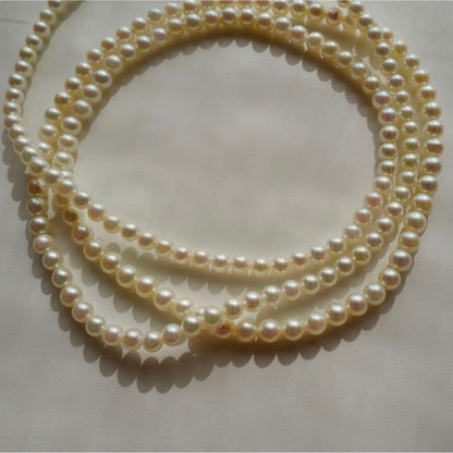 New Akoya pearls genuine baby long necklace 80.5cm with 5.0-4.0mm white pink pearls and silver fittings on display