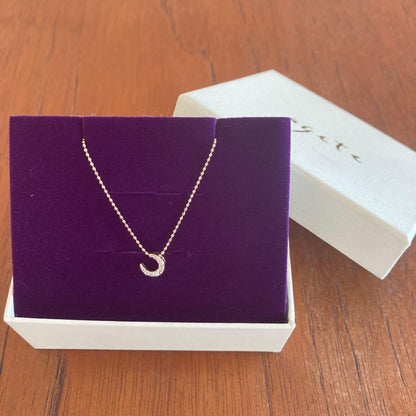 Agete K10 diamond moon necklace with eight diamonds on yellow gold ball chain
