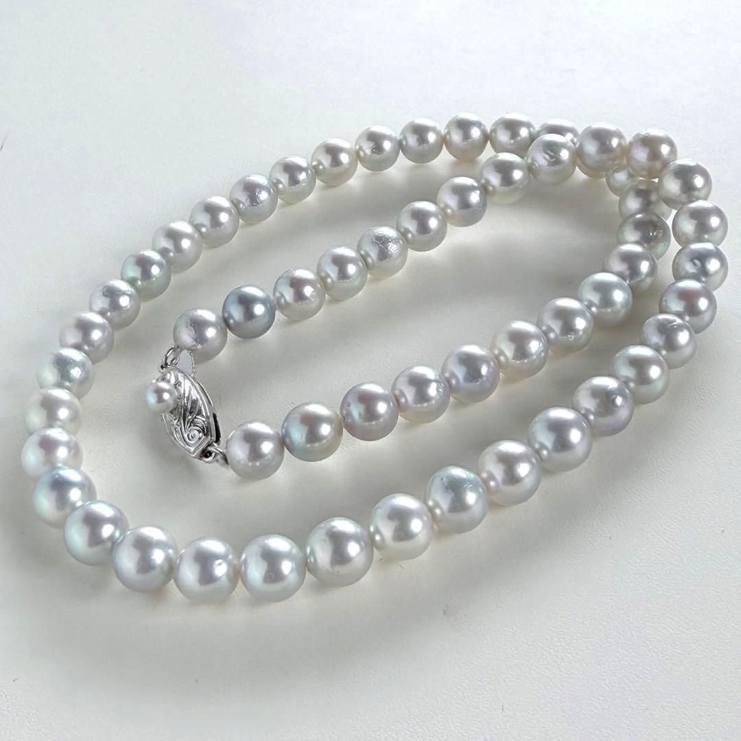 Tossaki Akoya pearl necklace featuring 7-7.5mm round pearls with silver clasp on a 42cm strand