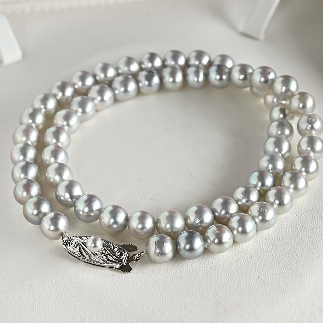 Tossaki Akoya pearl necklace featuring 7-7.5mm round pearls with silver clasp on a 42cm strand