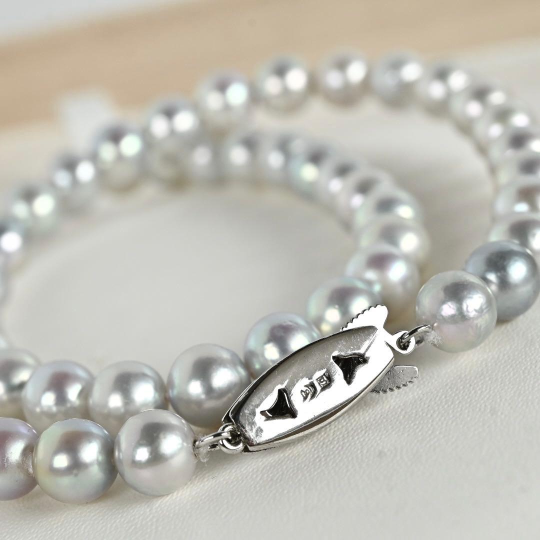 Tossaki Akoya pearl necklace featuring 7-7.5mm round pearls with silver clasp on a 42cm strand